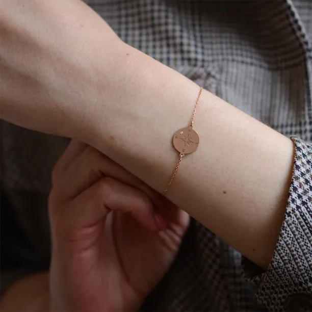 Gold bracelet with a compass and a diamond BOBBIE Image