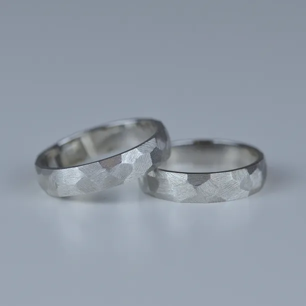 Pair of platinum wedding rings BOME with a textured surface