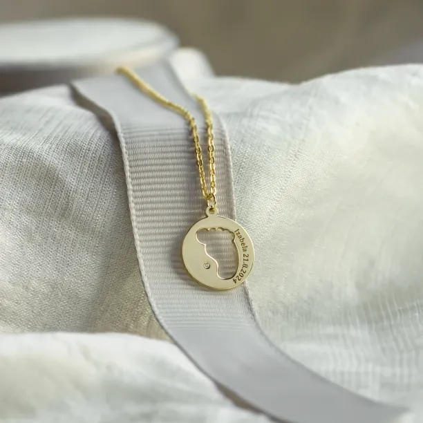 Gold diamond pendant with baby foot trace EIIA Image