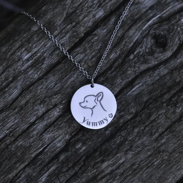 YUM silver dog pendant with diamond on a chain