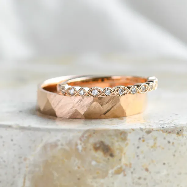 Gold diamond wedding rings LATI Image