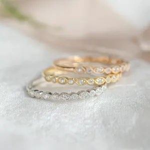 Gold diamond wedding rings LATI Thumbnail