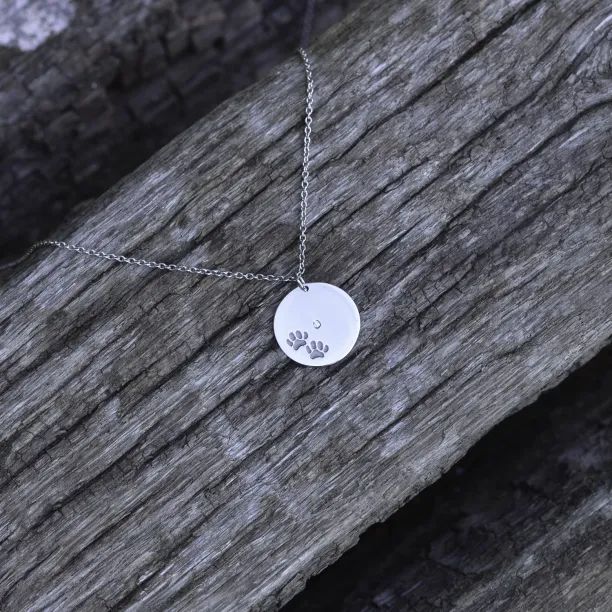 MORI golden pendant with dog traces