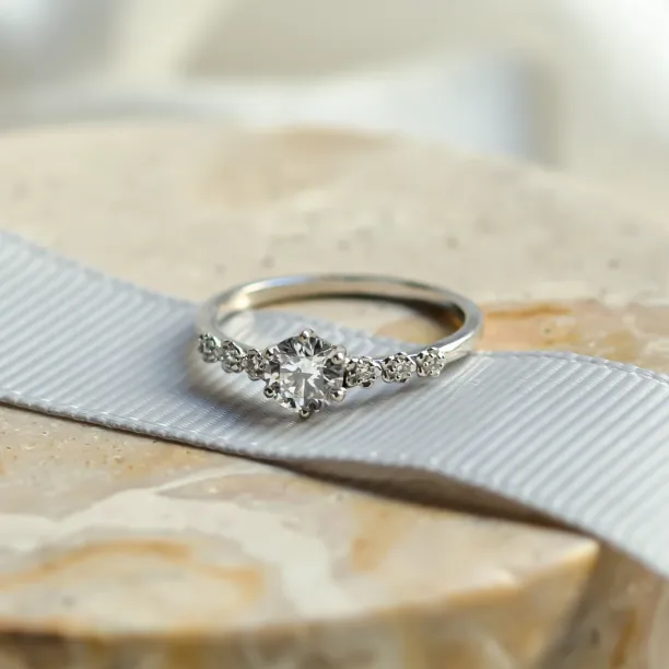 MISI gold moissanite engagement ring with side diamonds 0.5ct Image
