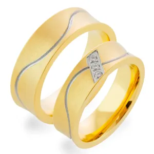 Close-up of LORI matte gold diamond wedding rings with three diamonds