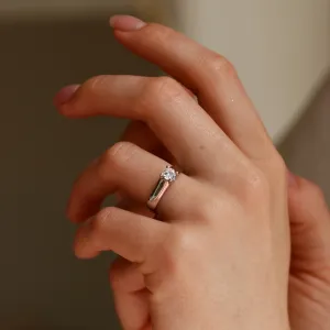 HEIM silver ring with zircon worn on a hand, angled view