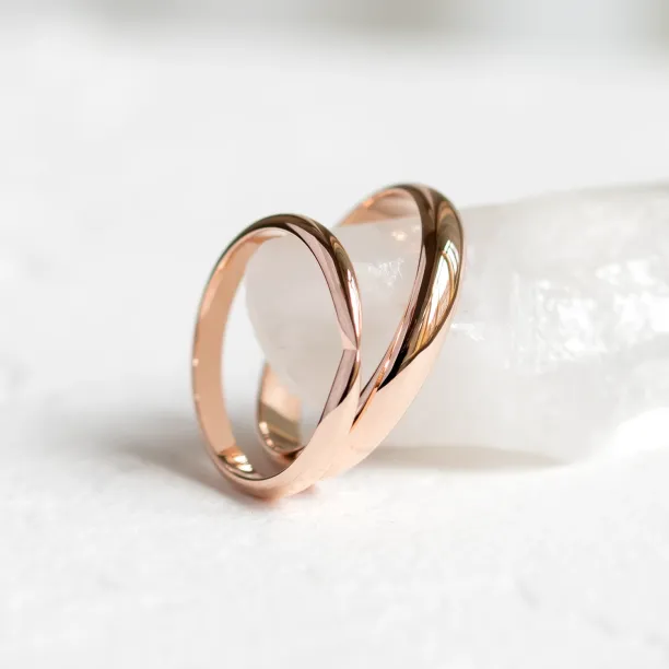 Gold wedding rings with bow tie shape LALI Image
