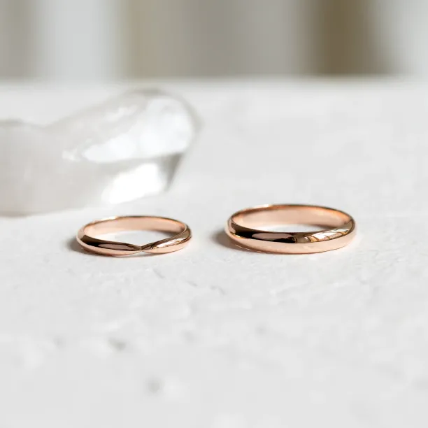 Gold wedding rings with bow tie shape LALI Image