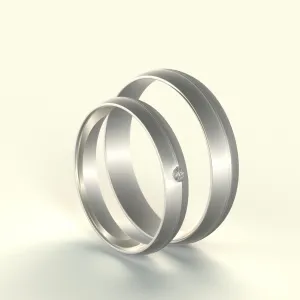 Snubní zlaté prsteny s diamanty BRONSE v šikmém pohledu