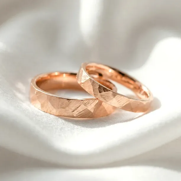 Gold hammered wedding rings BOMM Image