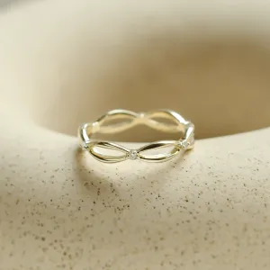 Gold diamond twisted ring shown from the front