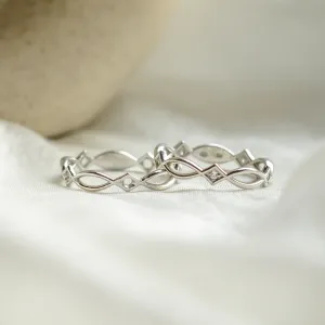 Close-up of the interlaced Celtic design on TARANIS rings
