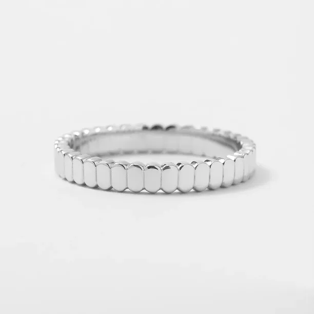Single NERA geometric wedding ring with a faceted organic surface