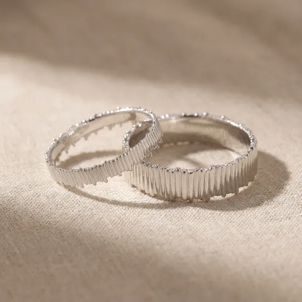 VELA geometric wedding rings with hand-textured vertical lines