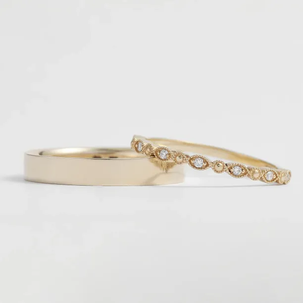 HONEY wedding rings shown together with a plain band and diamond eternity band