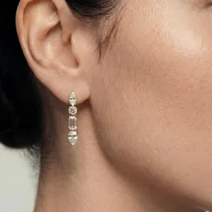 MARINA moissanite dangle earring worn on the ear