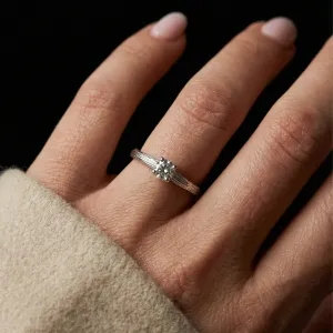 BRITTANY gold engagement ring with a lab grown diamond worn on the hand