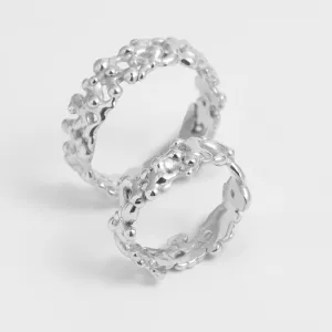 NALANI wedding rings showing their raised organic surface details