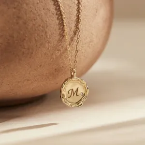 COLETTE personalised diamond necklace with engraved M pendant hanging freely