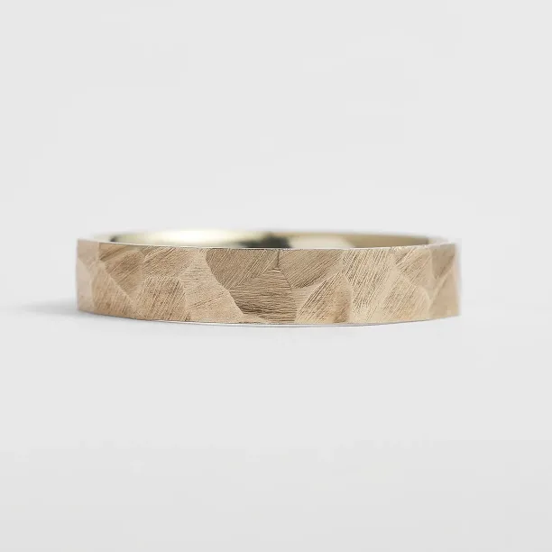 Gold hammered wedding rings BOMM Image