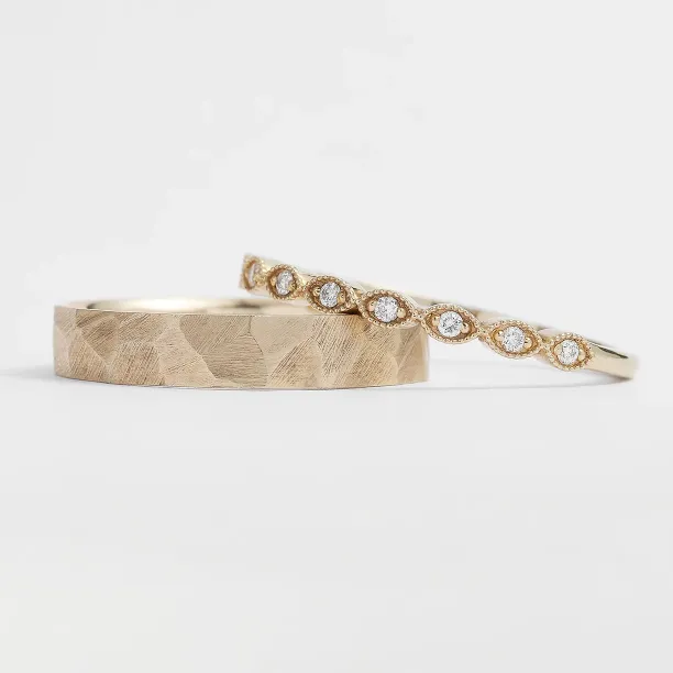 Gold diamond wedding rings LATI Image