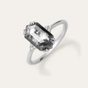 Angled close-up of the PAULI ring with lab-grown salt and pepper diamond