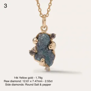 Angled view of the LAURA raw diamond pendant, stone 3