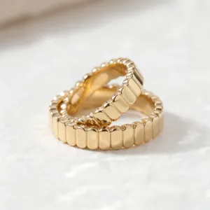 Pair of NERA geometric wedding rings in yellow gold