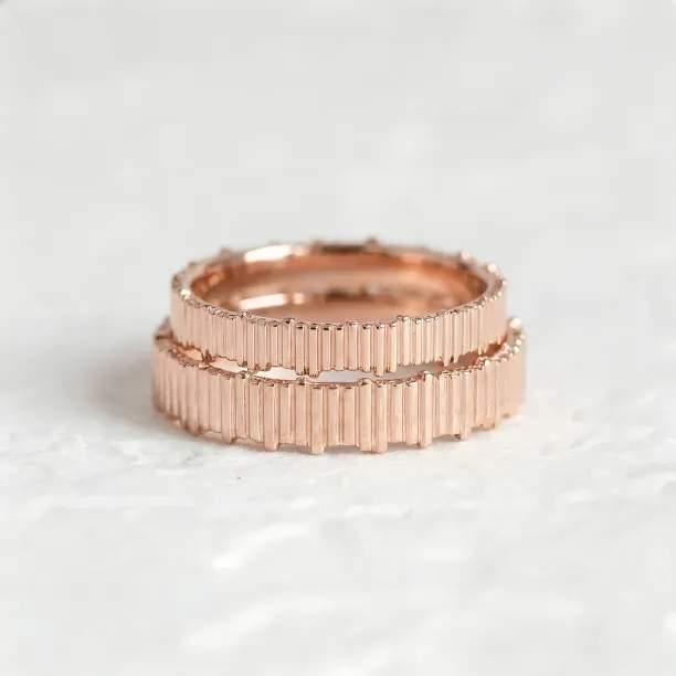 Stacked pair of VELA geometric wedding rings with textured bands