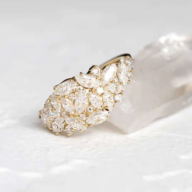 Angled close-up of the VALENTINA gold moissanite cluster ring