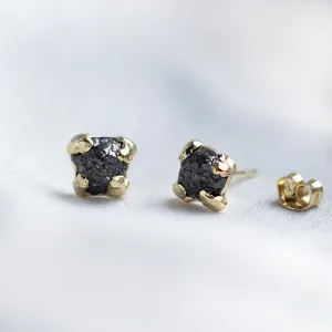 Close-up pair of CORDELIA earrings with irregular rough grey diamonds