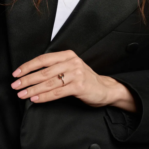 SYDNEY gold ring with a lab grown diamond and natural diamonds worn on a hand