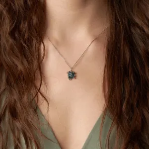 LAURA necklace with a raw diamond pendant worn on the neck
