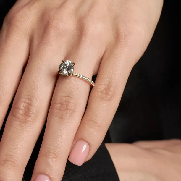 Close-up of the ARABELLA lab grown diamond ring worn on a hand