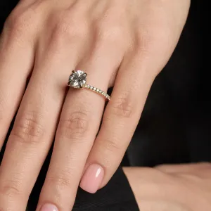 Close-up of the ARABELLA lab grown diamond ring worn on a hand