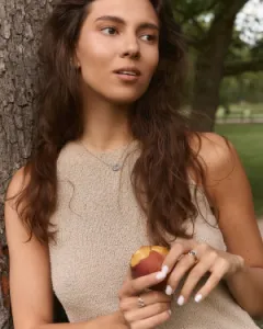 TREASURE salt and pepper diamond necklace worn with a wider view