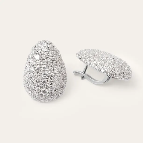 Pair of gold earrings with diamonds showing the front and clasp