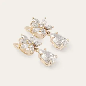 Angled view of the MARISSA pair of gold dangle earrings with lab-grown diamonds