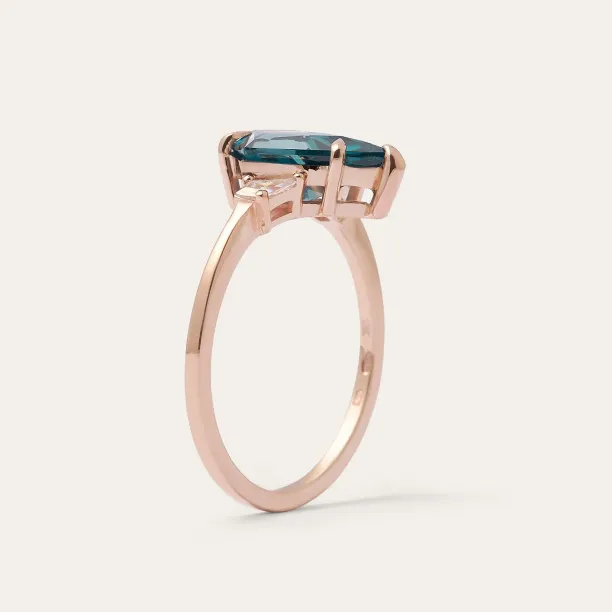 Underside view of the KATE ring with a lab-grown sapphire and moissanites