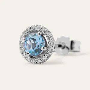 Close-up of one DOLLY stud earring with blue topaz and diamonds