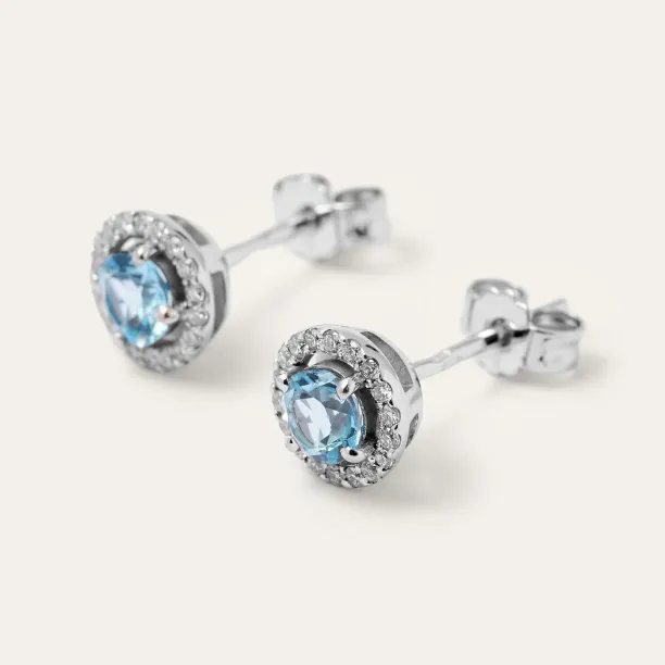 Angled view of the DOLLY earring pair showing their posts and backings