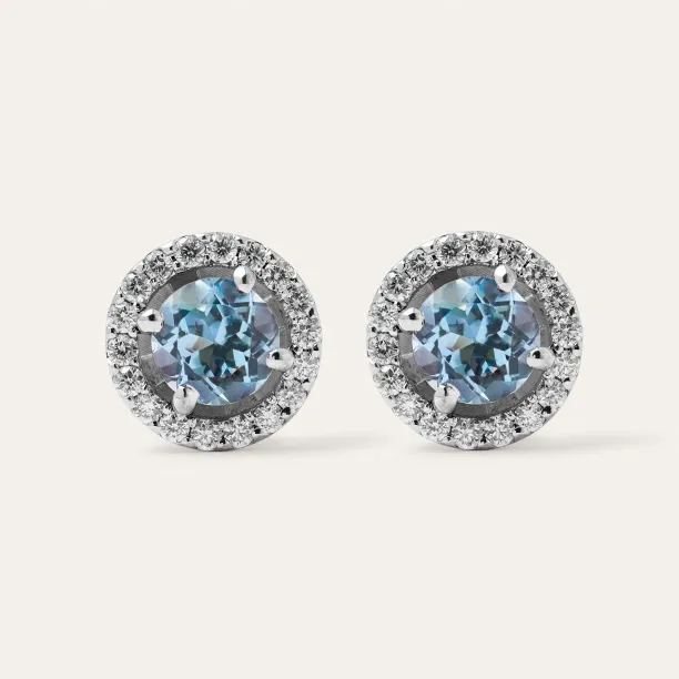 DOLLY stud earrings with blue topaz and diamonds, shown as a pair