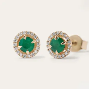 Close-up of MOLLY emerald and diamond earrings with one backing visible