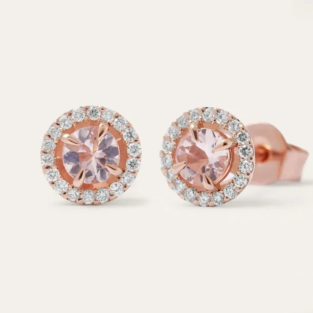 Close-up of NELLY gold earrings with faceted morganites and diamond surrounds