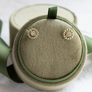 FLOS flower stud earrings displayed as a pair