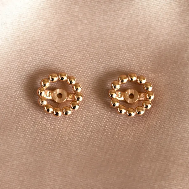 FLOS interchangeable flower frames shown separately from the earrings