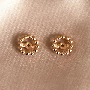 FLOS interchangeable flower frames shown separately from the earrings