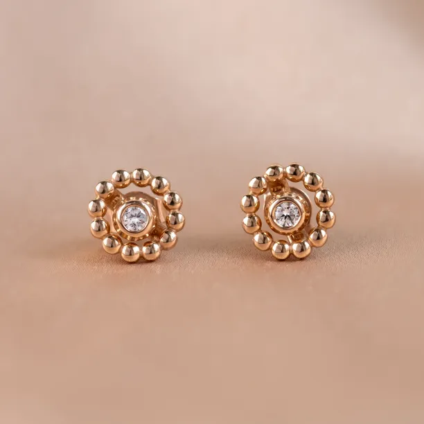 FLOS gold stud earrings with removable gemstones