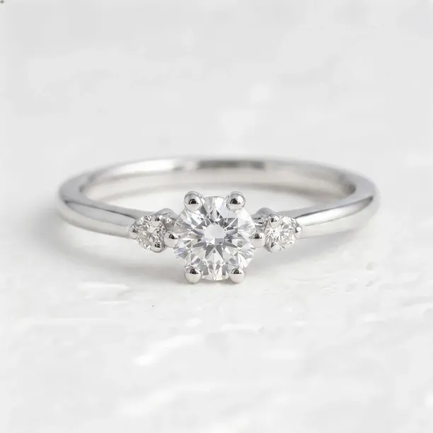 ALICIA gold engagement ring with three diamonds, detailed front view