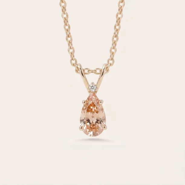 Gold SOLARIS pendant with orange lab-grown pear-shaped diamond and round diamond